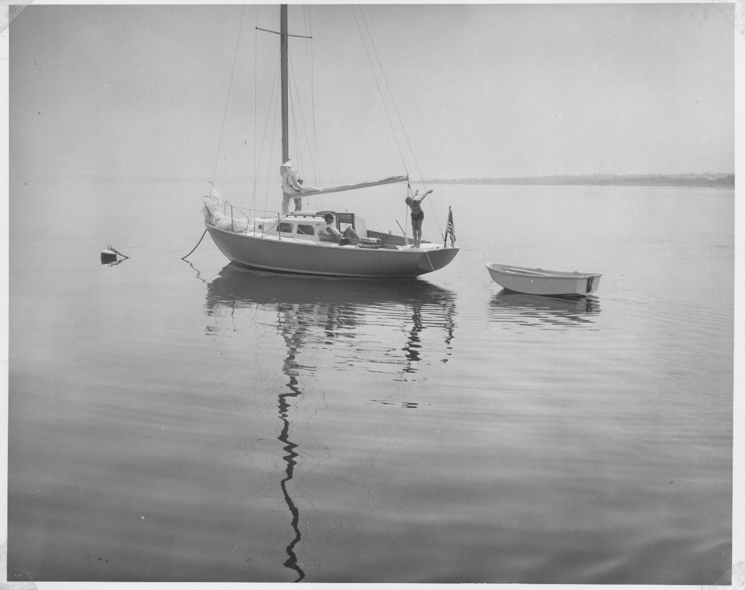Sailboat on tranquil waters, circa 1968